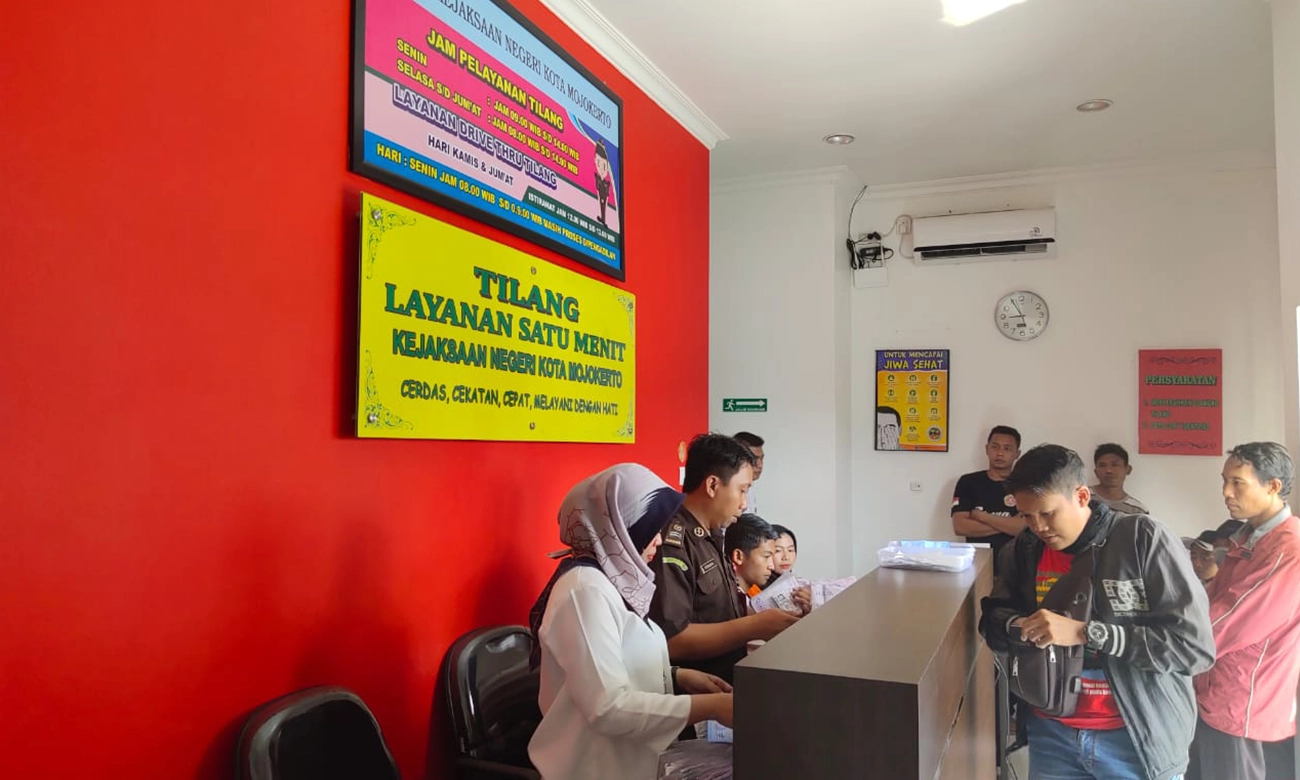 ilustrasi bayar denda tilang